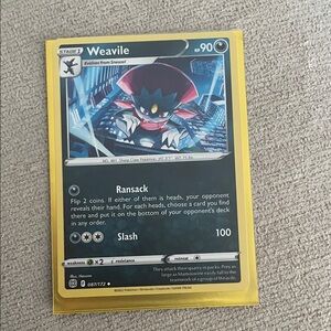 Weavile Pokémon Card with sleeve